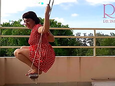 Cute housewife has fun without panties on the swing. Old bag swings and shows her perfect pussy.